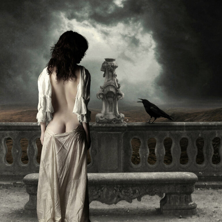 Gothic surreal fine art nude of a woman standing on a classical balcony with a raven, evoking mystery and symbolism.