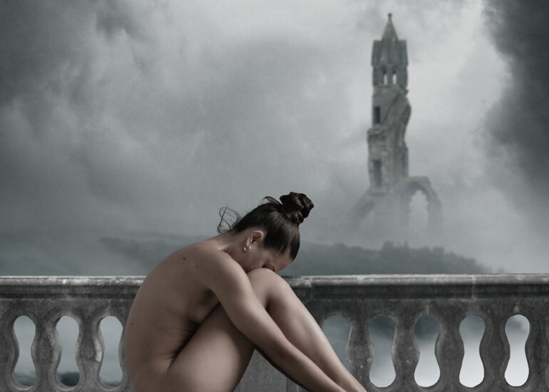 Atmospheric surreal fine art nude artwork of a woman curled on a stone bench beneath storm clouds and distant ruins.