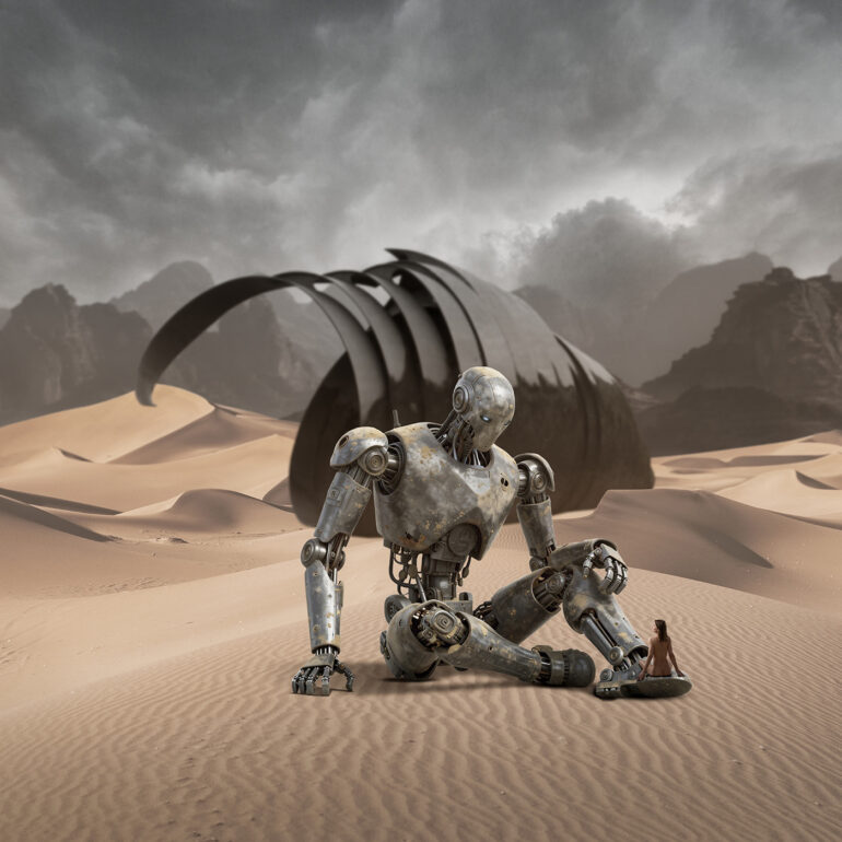 Surreal fine art image of a giant robot sitting in a desert with a small nude female figure beside it.