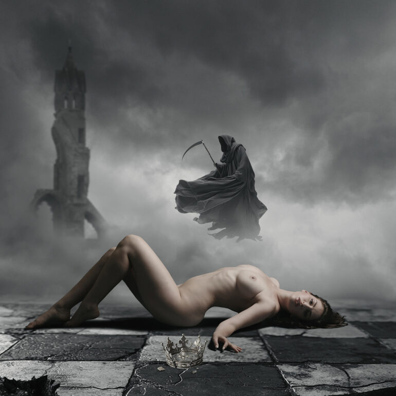 Gothic surreal photography featuring a nude figure, broken crown and hooded reaper in mist.